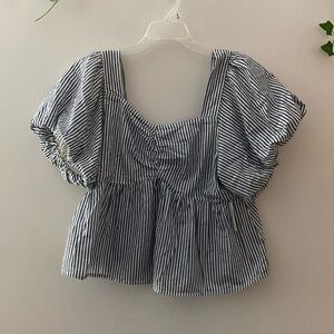 Woman’s stripped blouse